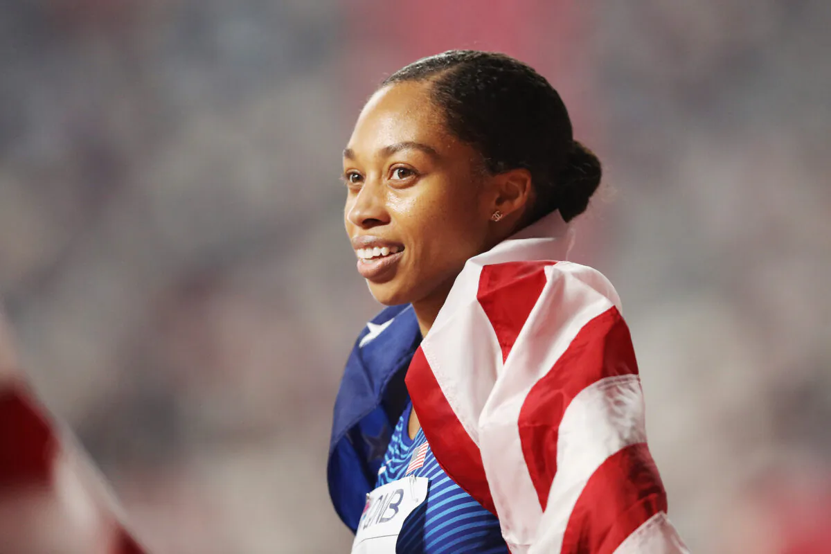 Allyson Felix of the United States reacts after setting a new world record in the 4x400 meter mixed relay during day three of 17th IAAF World Athletics Championships Doha 2019 at Khalifa International Stadium in Doha, Qatar, on Sept. 29, 2019. (Patrick Smith/Getty Images)