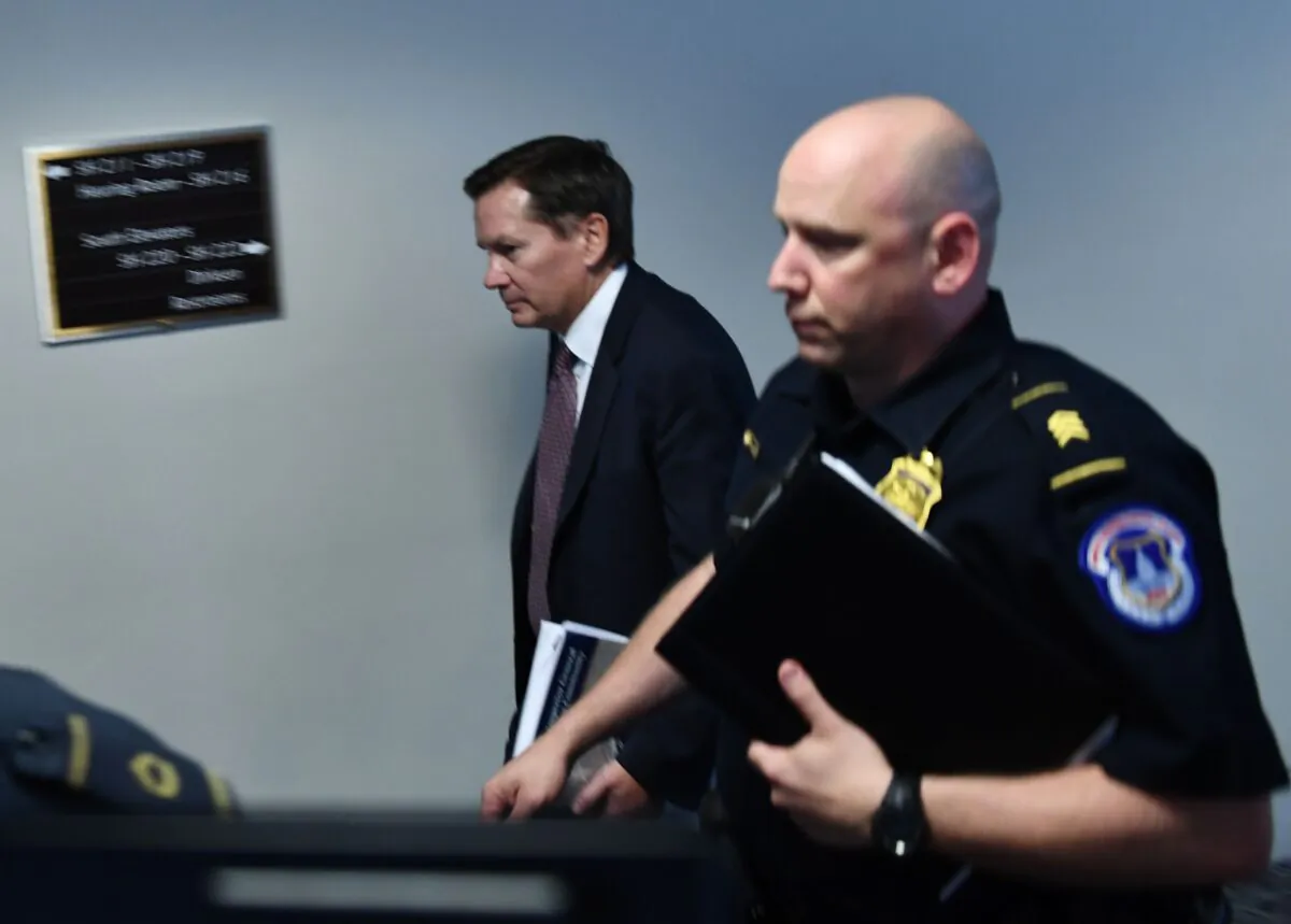 Inspector General of the Intelligence Community (L) Michael Atkinson arrives for a closed hearing with Acting Director of National Intelligence Joseph Maguire in Washington on Sept. 26, 2019. (Brendan Smialowski/Getty Images)