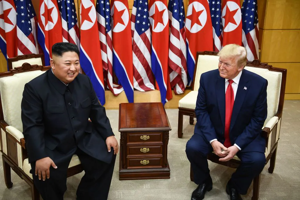 North Korean leader Kim Jong Un and U.S. President Donald Trump attend a meeting on the south side of the Military Demarcation Line that divides North and South Korea, in the Joint Security Area of Panmunjom in the demilitarized zone on June 30, 2019. (Brendan Smialowski/AFP/Getty Images)