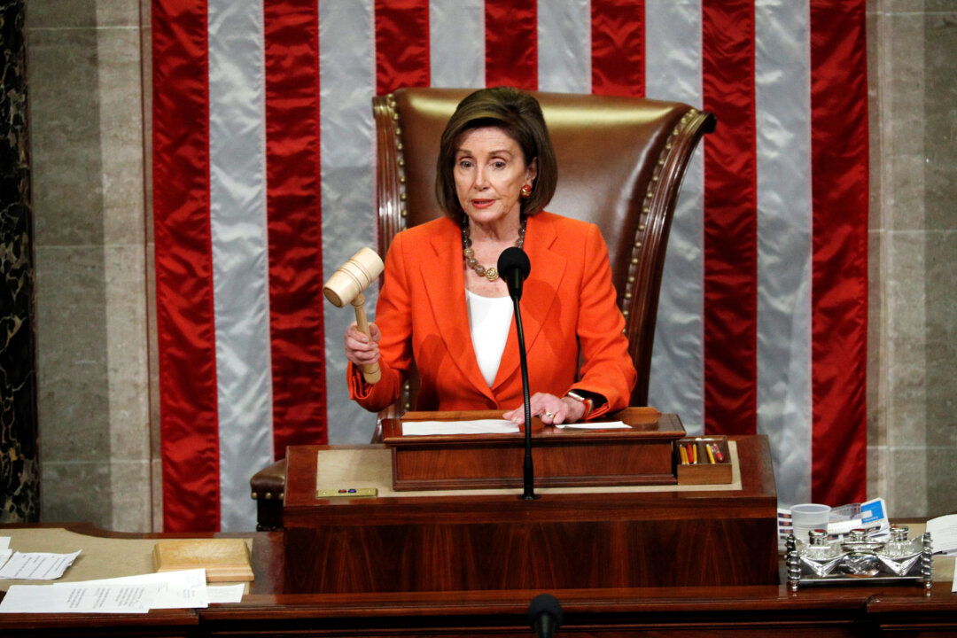 Speaker of the House Nancy Pelosi wields the gavel as she presides over the House of Representatives vote on a resolution that sets up the next steps in the impeachment inquiry of President Donald Trump on Capitol Hill in Washington on Oct. 31, 2019. (Tom Brenner/Reuters)