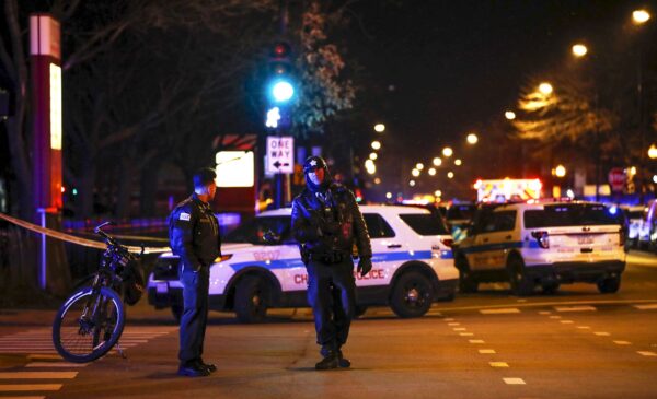 Chicago Police officers outside of the Chicago Mercy Hospital where a gunman opened fire in Chicago