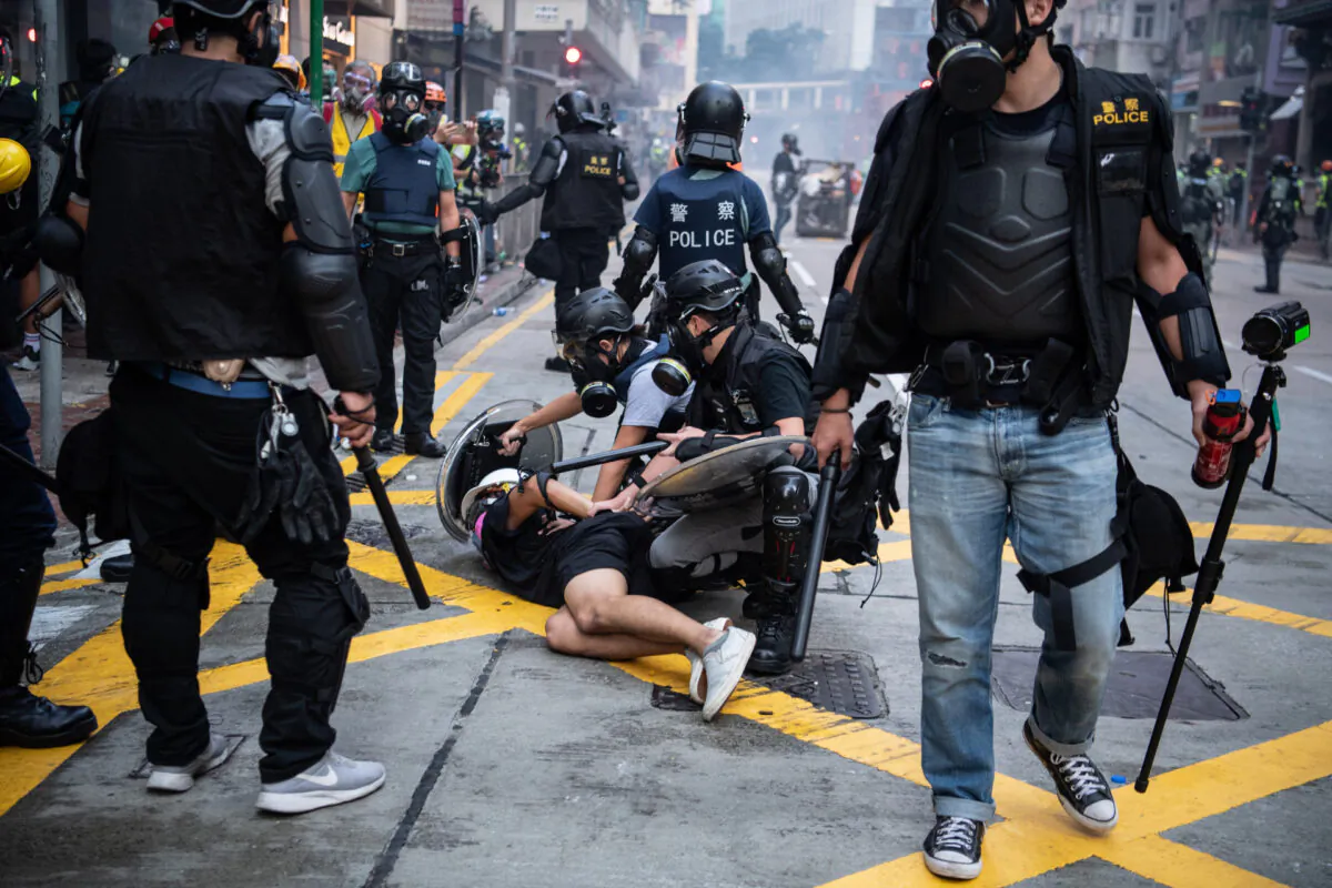 Police arrest a protester during clashes in Wan Chai in Hong Kong, on Oct. 1, 2019. (Laurel Chor/Getty Images)