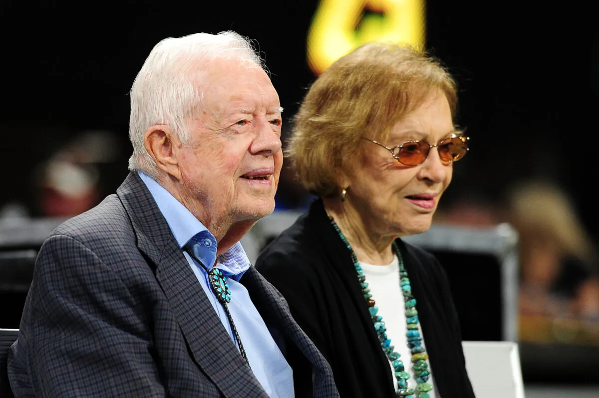 Former president Jimmy Carter and his wife Rosalynn before the game between the Atlanta Falcons and the Cincinnati Bengals at Mercedes-Benz Stadium in Atlanta, Georgia on Sept. 30, 2018. (Scott Cunningham/Getty Images)