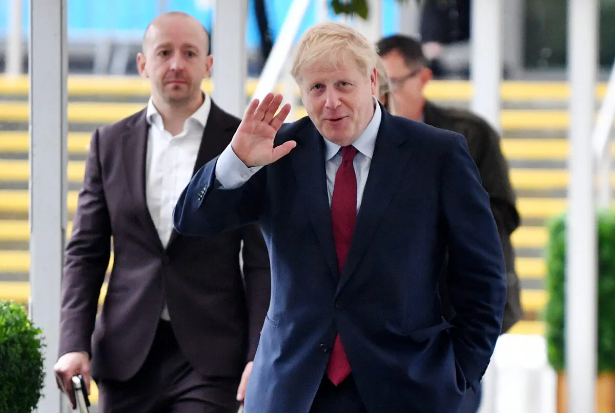 UK Prime Minister Boris Johnson walks to his hotel after attending an event on Oct. 1, 2019 in Manchester, England. (Jeff J Mitchell/Getty Images)