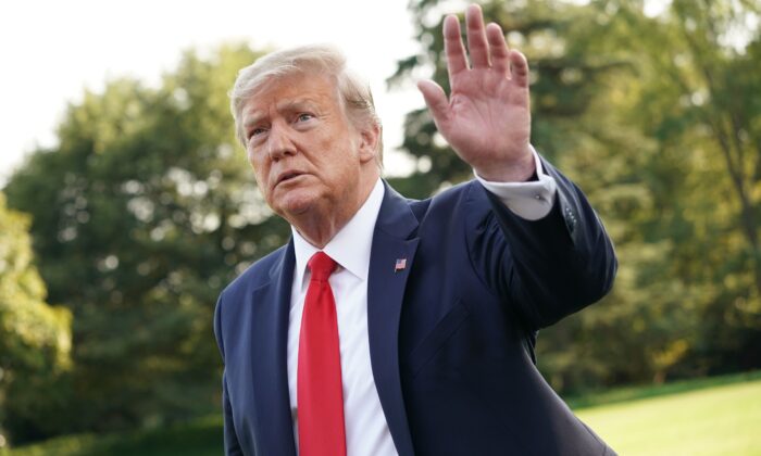 President Donald Trump gestures as he departs the White House in Washington on Sept. 16, 2019. (Mandel Ngan/AFP/Getty Images)
