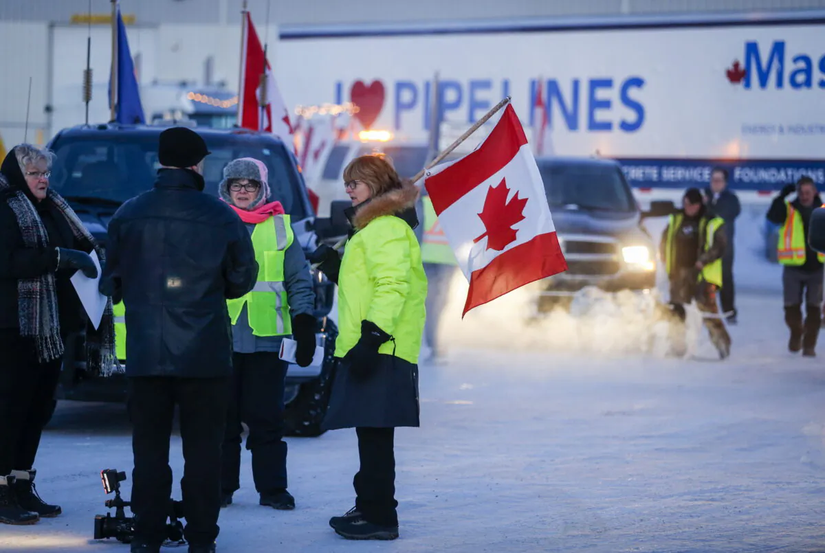 The "United We Roll" convoy of semi-trucks prepares to leave Red Deer, Alta., on Feb. 14, 2019, on its way to Ottawa to draw attention to lack of support for the energy sector and lack of pipelines. (The Canadian Press/Jeff McIntosh)
