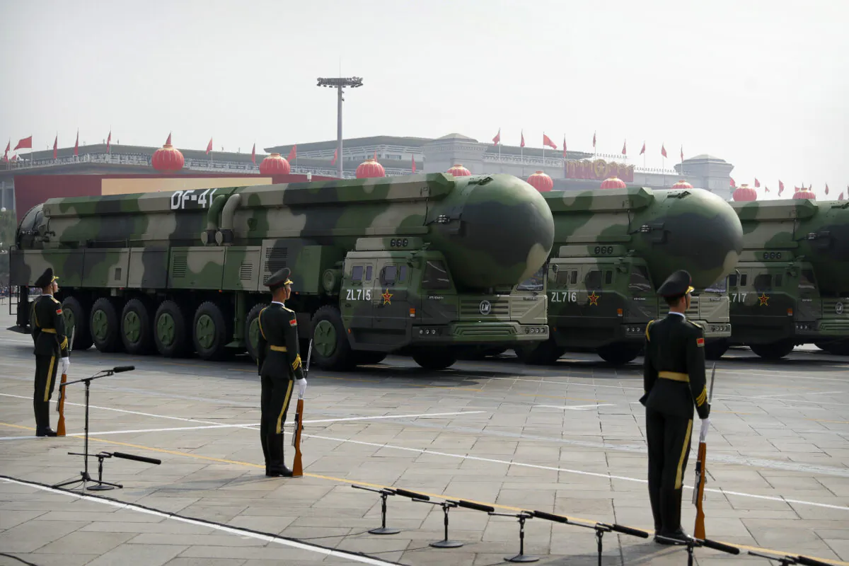 Chinese military vehicles carrying DF-41 ballistic missiles roll during a parade to commemorate the 98th anniversary of the founding of Communist China in Beijing, Chin, on Oct. 1, 2019. (Mark Schiefelbein/AP Photo)