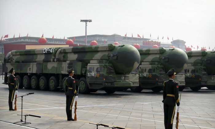 Chinese military vehicles carrying DF-41 ballistic missiles roll during a parade to commemorate the 70th anniversary of the founding of communist China in Beijing on Oct. 1, 2019. (Mark Schiefelbein/AP Photo)