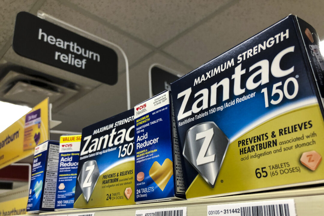Packages of Zantac, a popular medication which decreases stomach acid production and prevents heartburn, sit on a shelf at a drugstore in New York City on Sept. 19, 2019. (Drew Angerer/Getty Images)