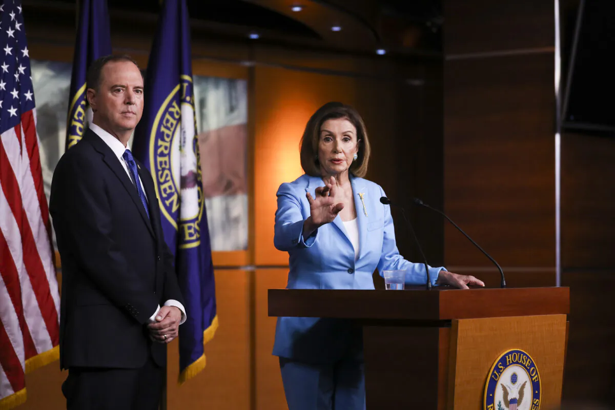Speaker of the House Nancy Pelosi (D-Calif.) and Rep. Adam Schiff (D-Calif.), House intelligence chairman, hold a press conference about the impeachment inquiry of President Trump, at the Capitol in Washington on Oct. 2, 2019. (Charlotte Cuthbertson/The Epoch Times)