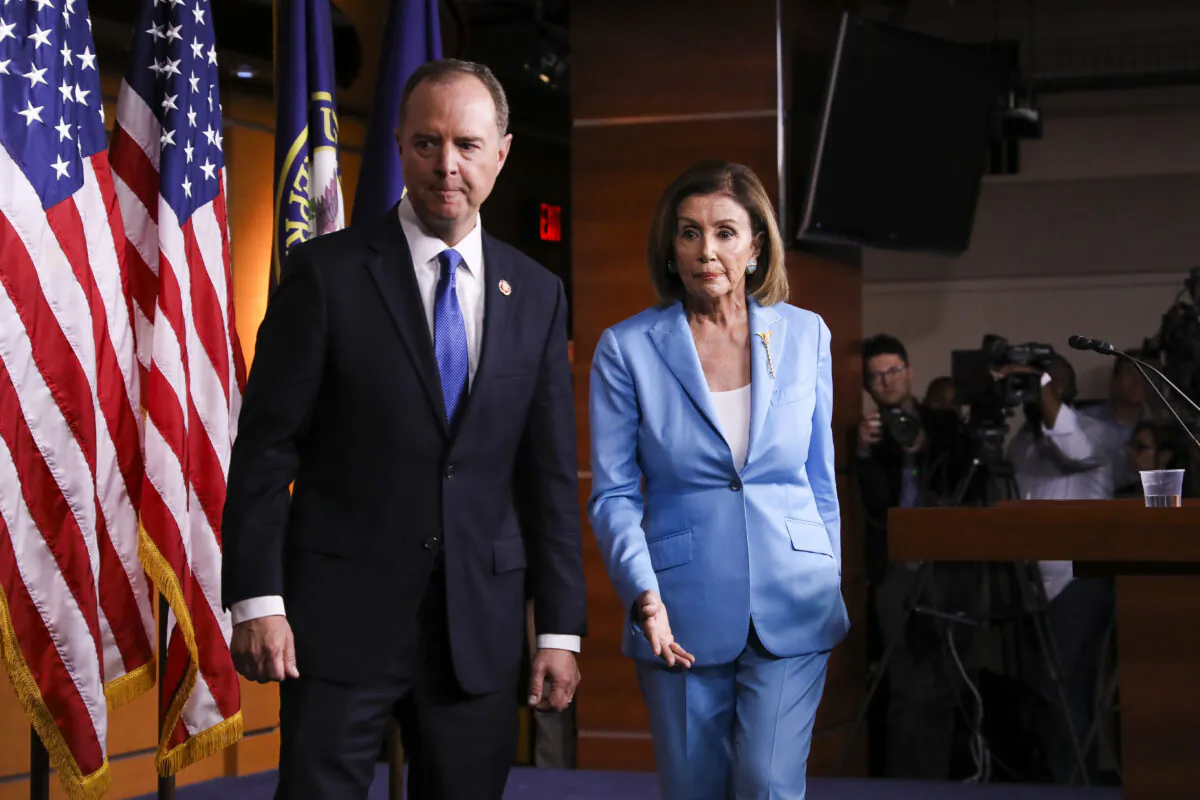 Speaker of the House Nancy Pelosi (D-Calif.) and Rep. Adam Schiff (D-Calif.), House intelligence chairman, hold a press conference on the impeachment inquiry of U.S. President Donald Trump at the Capitol in Washington on Oct. 2, 2019. (Charlotte Cuthbertson/The Epoch Times)
