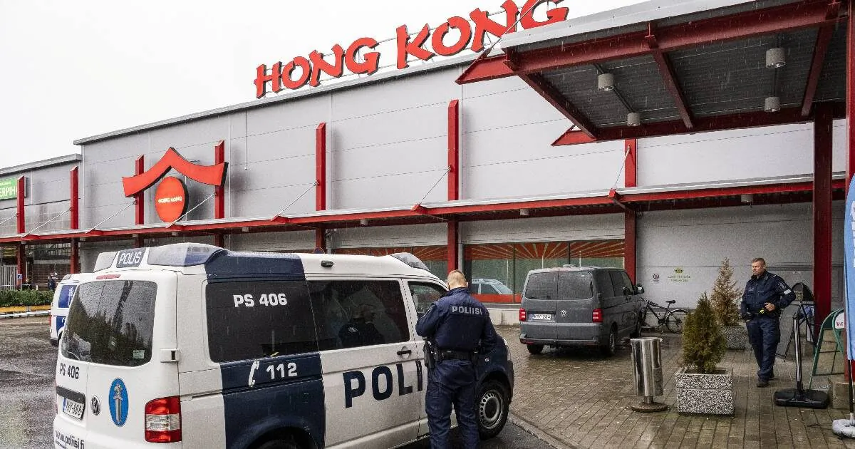 Policemen in front of the Herman shopping center where the Savo Vocational College is located in Kuopio, Finland, on Oct. 1, 2019. (Hannu Rainamo/Lehtikuva/via Reuters)