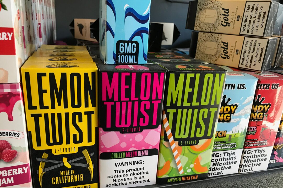 Flavored vaping products containing nicotine are seen in a store in Los Angeles, California, Sept. 17, 2019. (ROBYN BECK/AFP/Getty Images)