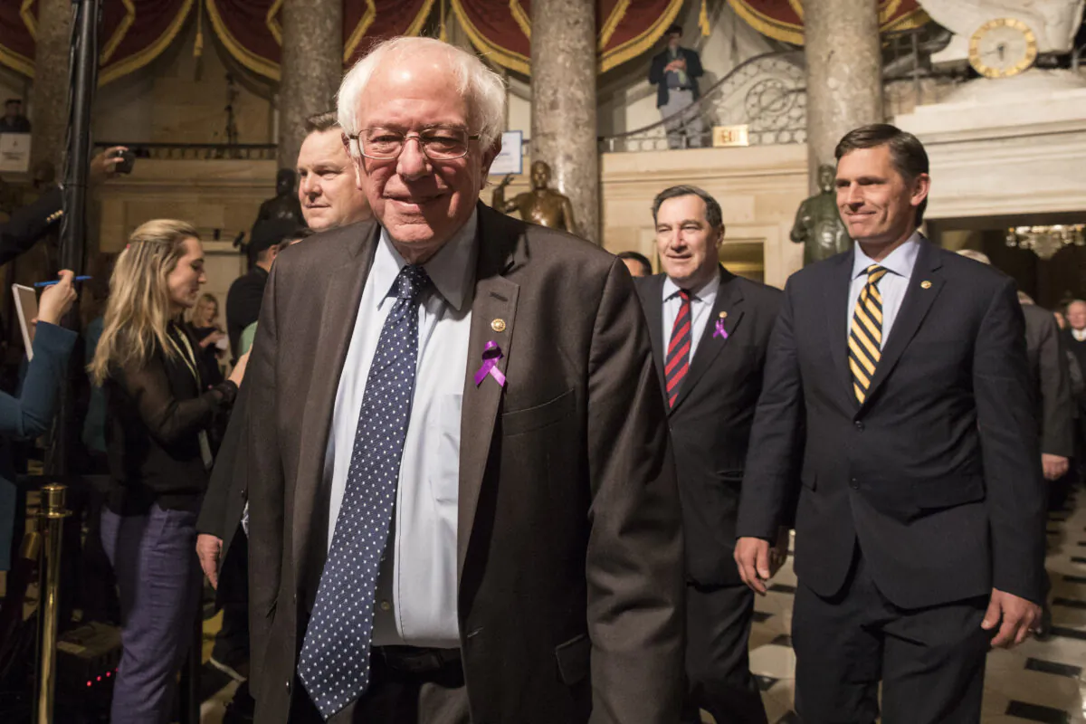 Sen. Bernie Sanders (I-Vt.) in the Statuary Hall of the Capitol building on the way to attending the State of the Union in Washington on Jan. 30, 2018. (Samira Bouaou/The Epoch Times)