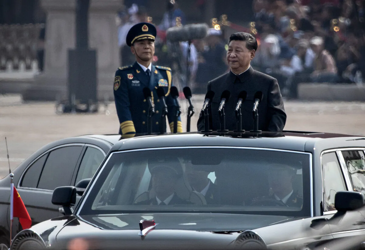Chinese leader Xi Jinping attends a parade to celebrate the 70th anniversary of the founding of communist China at Tiananmen Square in Beijing on Oct. 1, 2019. (Kevin Frayer/Getty Images)