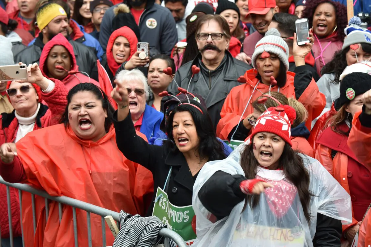 Striking teachers and their supporters rally in downtown Los Angeles, Calif., on Jan. 15, 2019. (Photo by Robyn Beck / AFP)        (Photo credit should read ROBYN BECK/AFP/Getty Images)