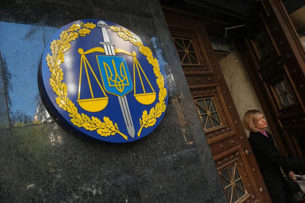 A woman leaves the offices of the Ukrainian General Prosecutor in Kiev, Ukraine, on Oct. 02, 2019. Ukraine has found itself at the core of a political storm in U.S. politics since the release of a whistleblower's complaint accusing President Donald Trump of abuse of power in requesting an investigation into Joe Biden, and Biden's son, Hunter. (Sean Gallup/Getty Images)