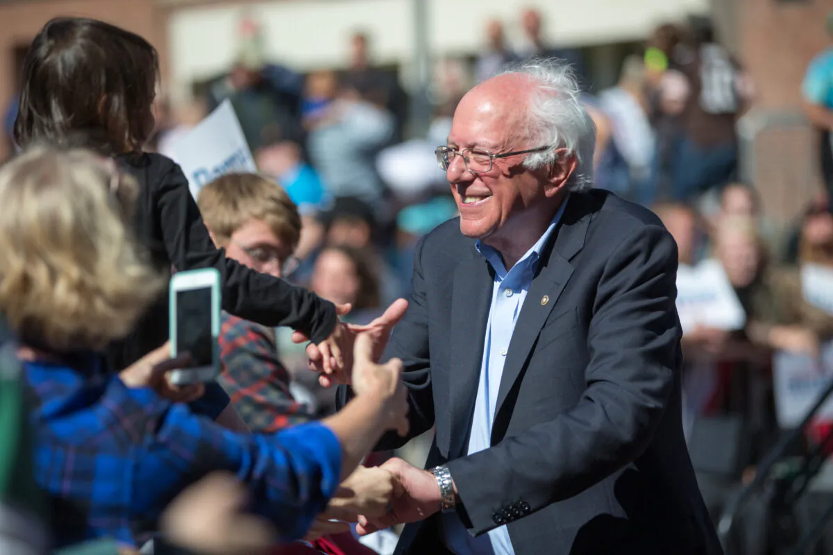 Democratic presidential candidate Sen. Bernie Sanders (I-Vt.) shakes hands with supporters following his event at Plymouth State University in Plymouth, New Hampshire, on Sept. 29, 2019. (Scott Eisen/Getty Images)