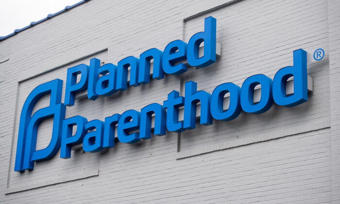 The logo of Planned Parenthood is seen outside the Planned Parenthood Reproductive Health Services Center in St. Louis, Missouri, on May 30, 2019. (Saul Loeb/AFP/Getty Images)