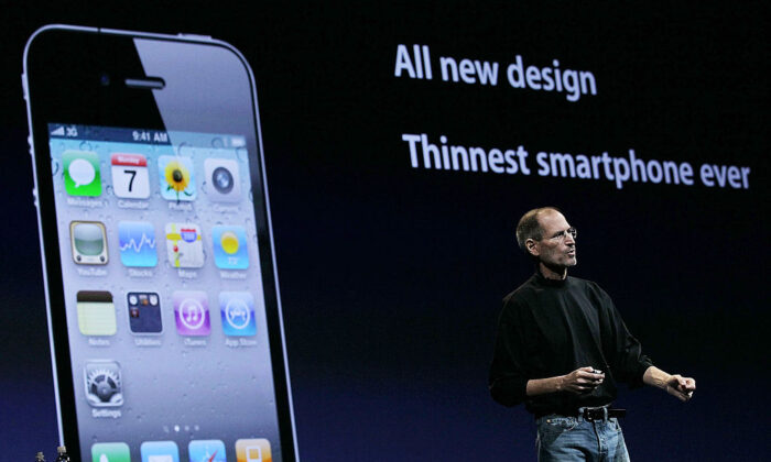 Apple CEO Steve Jobs announces the new iPhone 4 as he delivers the opening keynote address at the 2010 Apple World Wide Developers conference in San Francisco, on June 7, 2010. (Justin Sullivan/Getty Images)