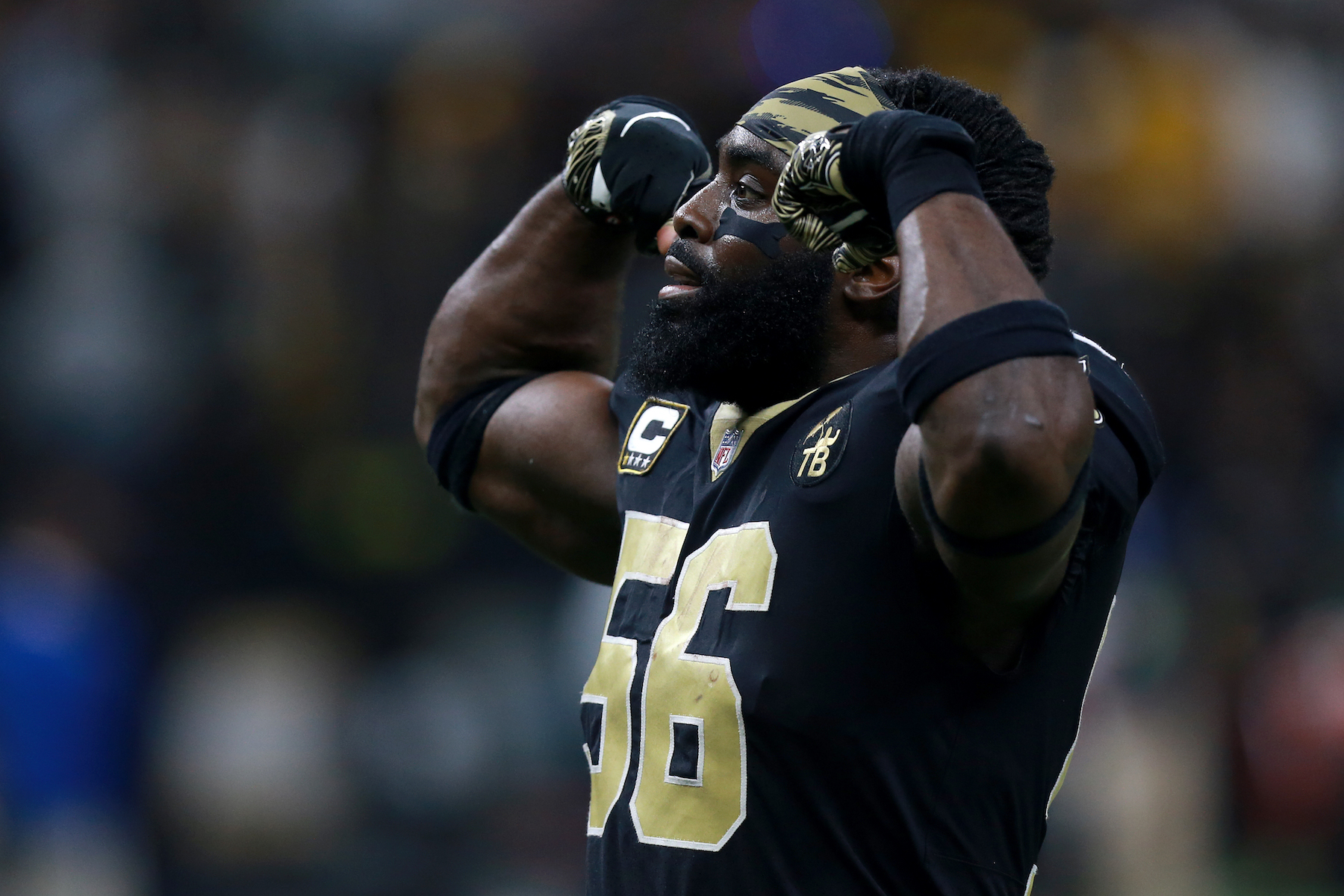 The NFL tried to fine the Saints' Demario Davis for his 'Man of God'  headband. Here's what happened next