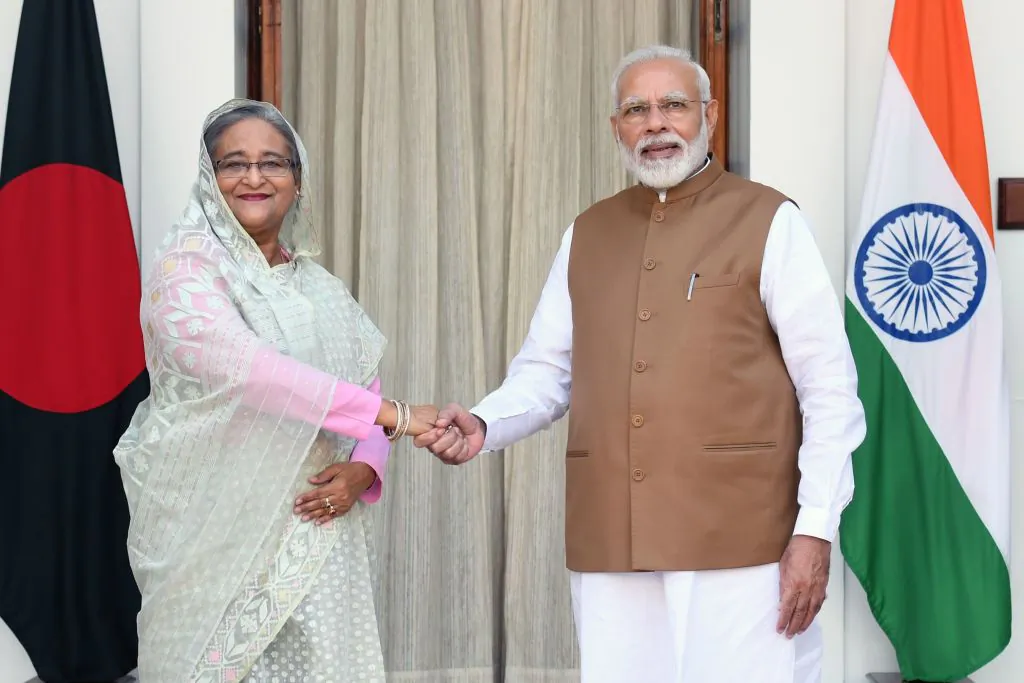 India's Prime Minister Narendra Modi (R) shakes hands with Bangladesh's Prime Minister Sheikh Hasina prior to a meeting in New Delhi on Oct. 5, 2019. (Prakash Singh/AFP via Getty Images)