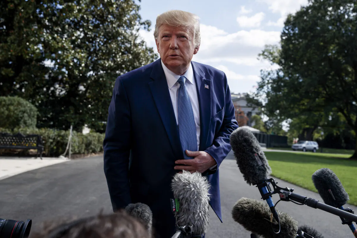 President Donald Trump talks to reporters on the South Lawn of the White House, on Oct. 4, 2019. (Evan Vucci/AP Photo)