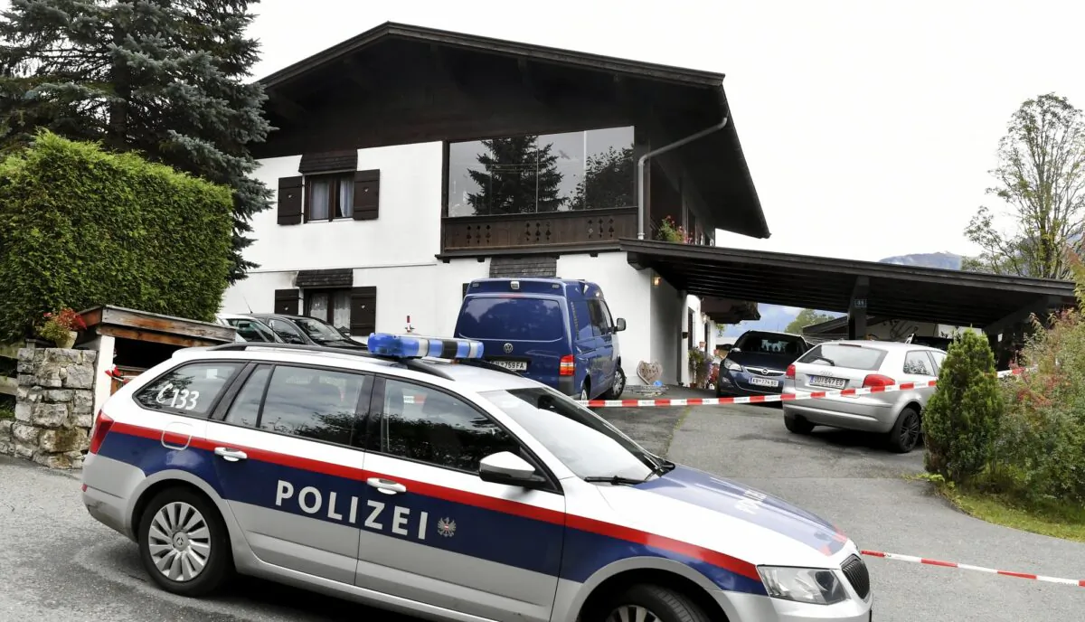 A police car is parked in front of a house in Kitzbühel, Austria, on Oct. 6, 2019. (Kerstin Joensson/AP Photo)