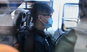 2 Protesters Have Been Charged Under Hong Kong's Emergency Anti-Mask Law