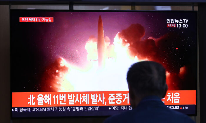 People watch a TV showing a file image of a North Korean missile launch at the Seoul Railway Station in Seoul, South Korea, on Oct. 2, 2019. (Chung Sung-Jun/Getty Images)