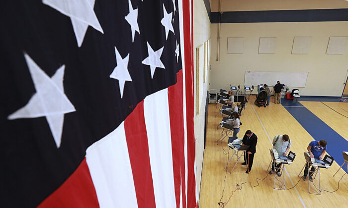 People cast their ballots in the presidential election at Freedom Academy elementary school in Provo, Utah, on Nov. 8, 2016.  (George Frey/Getty Images)