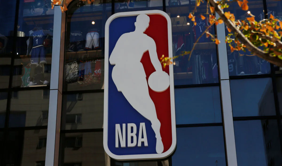 An NBA logo is seen on the facade of its flagship store at the Wangfujing shopping street in Beijing, China, on Oct. 8, 2019. (Tingshu Wang/Reuters)