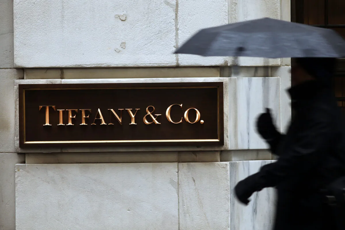 A person walks past a Tiffany & Co. store along Wall Street in Manhattan in New York, N.Y., on Jan. 12, 2015. (Spencer Platt/Getty Images)