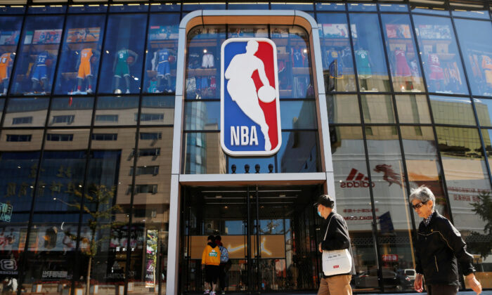 People enter an NBA store on the Wangfujing shopping street in Beijing on Oct. 8, 2019. (Reuters/Tingshu Wang)