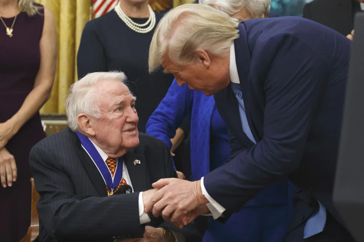President Donald Trump presents the Presidential Medal of Freedom to former Attorney General Edwin Meese, in the Oval Office of the White House, Washington, on Oct. 8, 2019. (AP Photo/Alex Brandon)