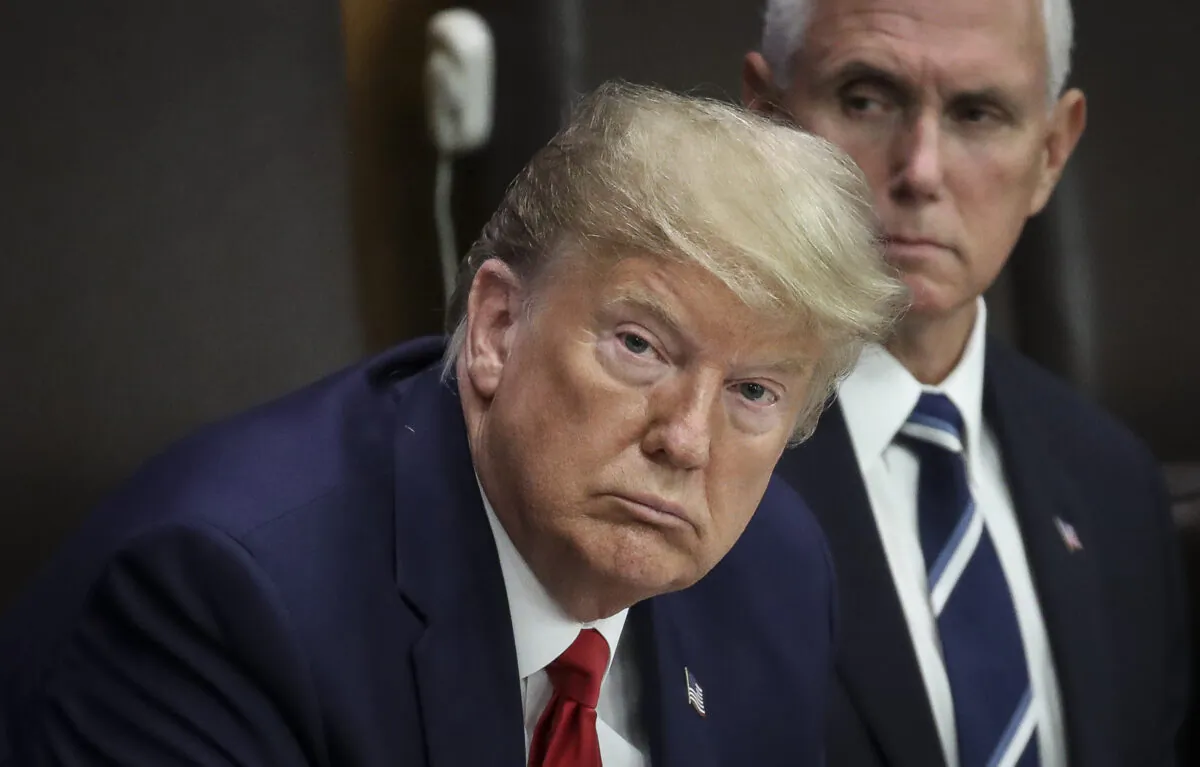 President Donald Trump, left, and Vice President Mike Pence attend a meeting on religious freedom at United Nations (U.N.) headquarters on Sept. 23, 2019 in New York City. (Drew Angerer/Getty Images)