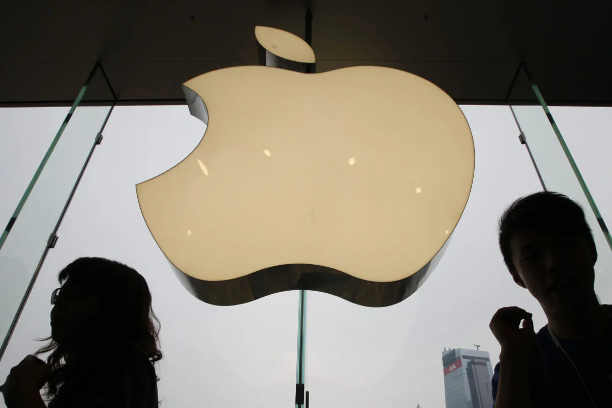 An Apple logo is displayed at the Apple store in International Financial Center (IFC) shopping Mall, in Hong Kong, on Sept. 24, 2011, photo. (AP Photo/Kin Cheung)