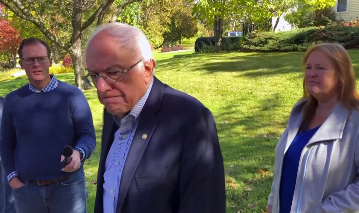 Democratic presidential candidate Sen. Bernie Sanders (I-Vt.) speaks to reporters outside his home in Burlington, Vt., on Oct. 8, 2019. (Wilson Ring/AP Photo)