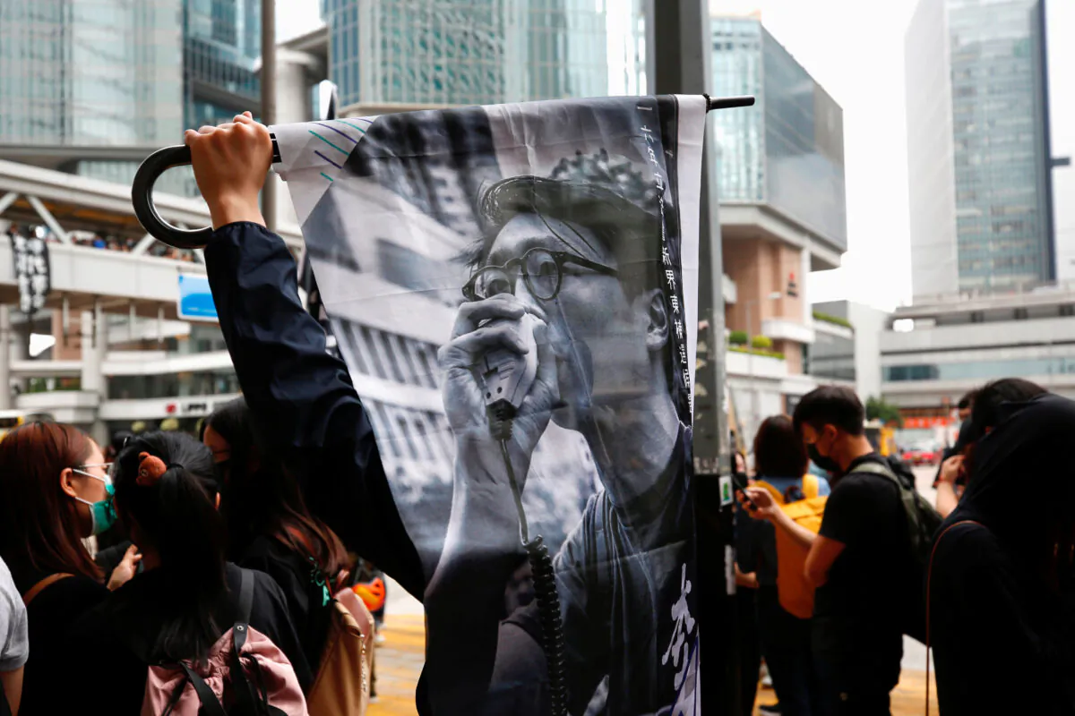 Supporters of jailed activist Edward Leung, gather outside the High Court as Leung appeals against his conviction and sentence, in Hong Kong, China, October 9, 2019. (Tyrone Siu/Reuters)
