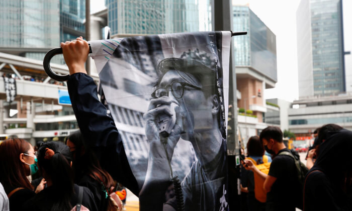 Supporters of jailed activist Edward Leung, gather outside the High Court as Leung appeals against his conviction and sentence, in Hong Kong, China, October 9, 2019. (Tyrone Siu/Reuters)