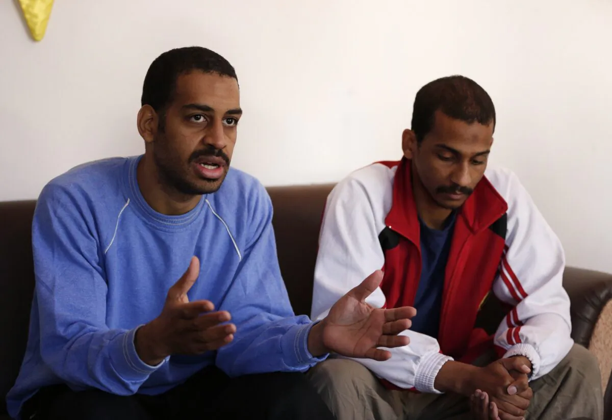 Alexanda Amon Kotey (L) and El Shafee Elsheikh, speak at a security center in Kobani, Syria, in a file photograph. (Hussein Malla, File/AP Photo)