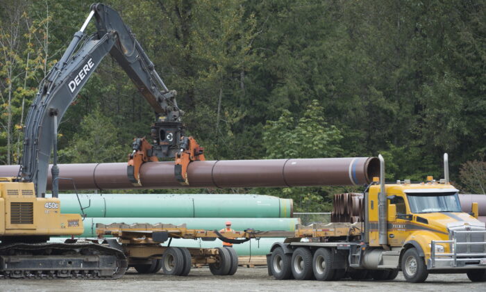 Pipeline pipes are seen at a Trans Mountain facility near Hope, B.C., on Aug. 22, 2019. (Jonathan Hayward/The Canadian Press)