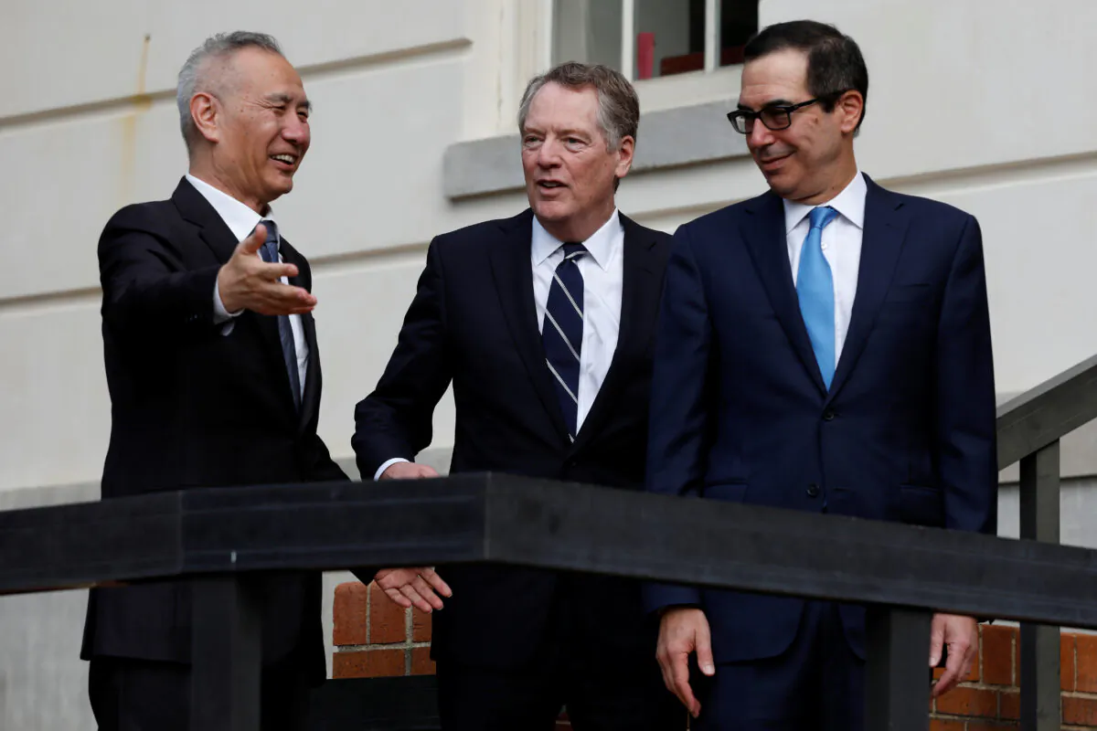 U.S. Treasury Secretary Steve Mnuchin (R) and Trade Representative Robert Lighthizer welcome China's Vice Premier Liu He before the two countries' trade negotiations in Washington, D.C., on Oct. 10, 2019. (Yuri Gripas/Reuters)