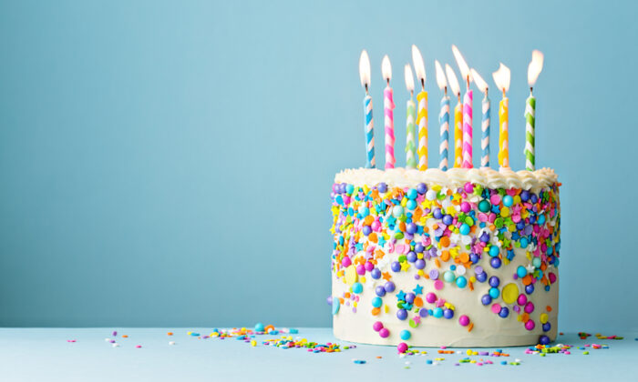 Make a wish—and pass the cake. (Shutterstock)