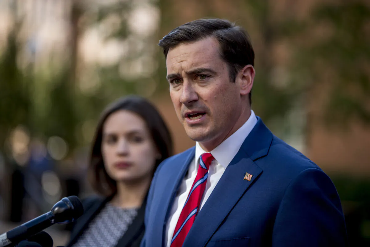 Attorney General for the Eastern District of Virginia G. Zachary Terwilliger, right, accompanied by Assistant United States Attorney Danya Atiyeh, left, announce the arrest of Henry Kyle Frese, a  Defense Intelligence Agency official charged with leaking classified information to two journalists, including one he was dating, during a news conference outside the federal courthouse in Alexandria, Va.,on Oct. 9, 2019. (Andrew Harnik/AP)