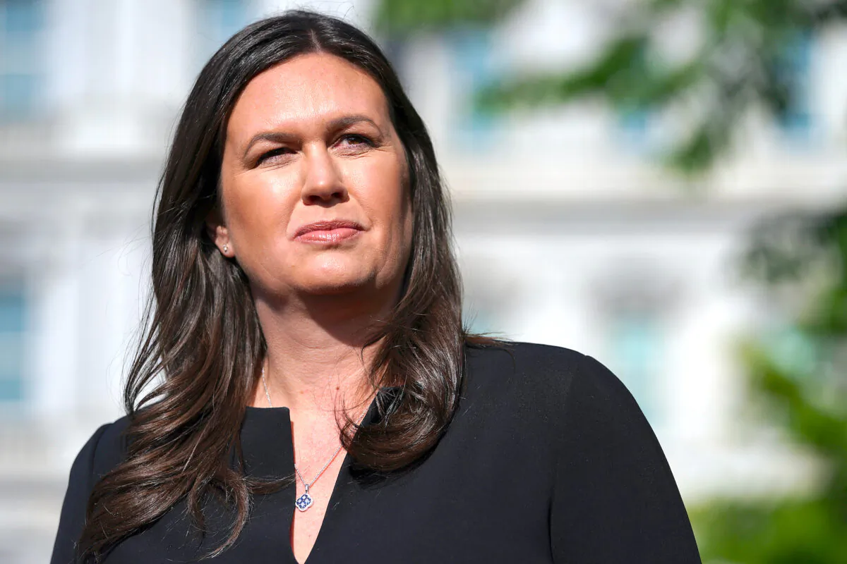 Former White House Press Secretary Sarah Huckabee Sanders talks to reporters outside the White House in Washington, on April 29, 2019. (Chip Somodevilla/Getty Images)