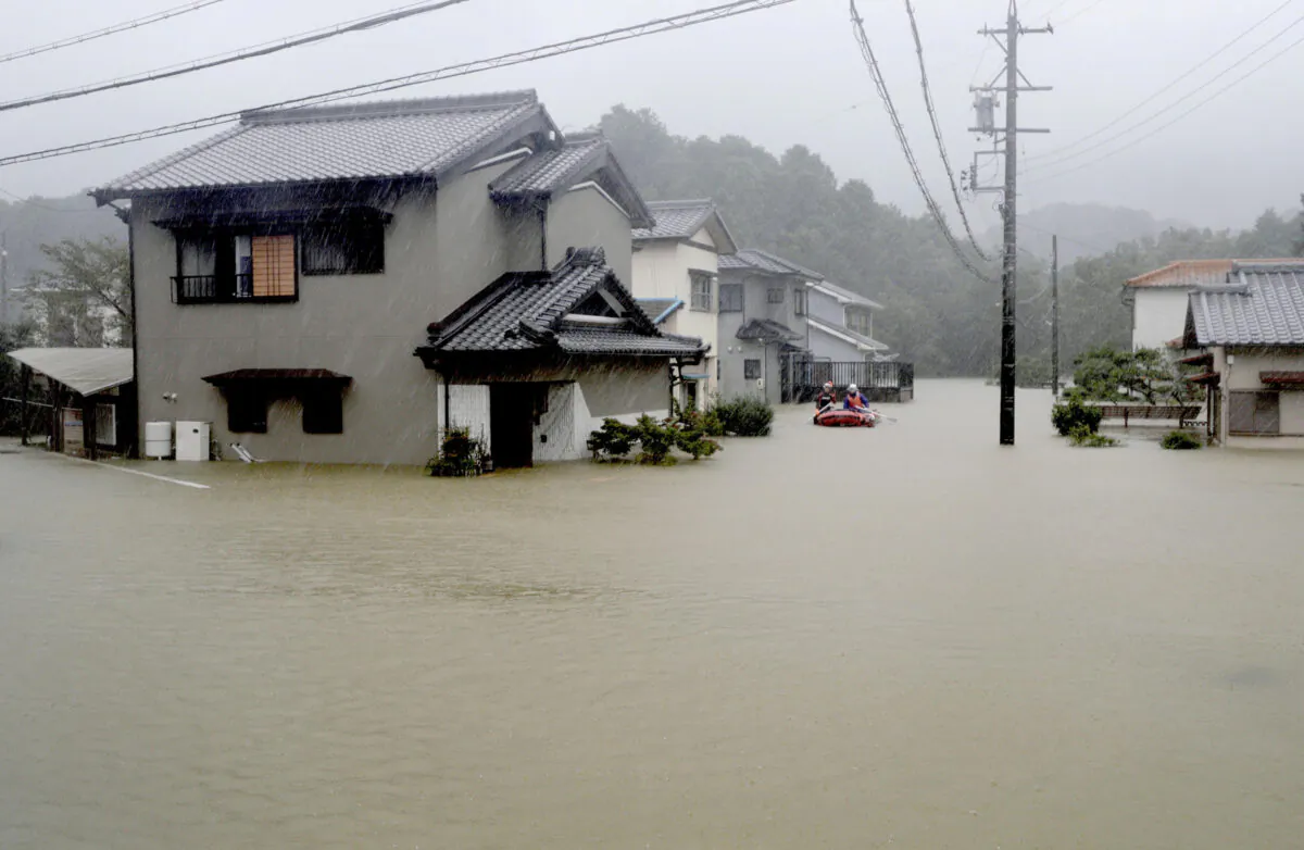 Heavy rains caused by Typhoon Hagibis flood a residential area in Ise, central Japan, in this photo taken by Kyodo on Oct. 12, 2019. (Courtesy of Kyodo/via Reuters
