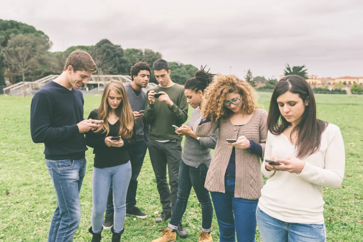 Digital devices are a gateway to a million habit-forming apps. Don't thumb away the chance to make some real memories. (William Perugini/Shutterstock)