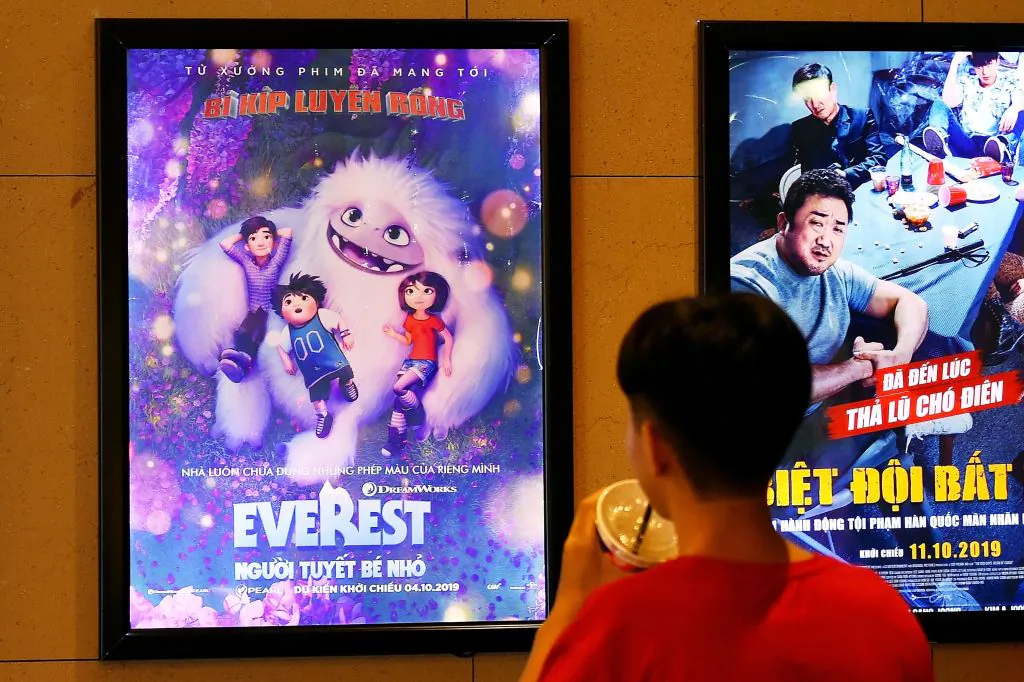 A boy looks at a poster for the animated movie "Everest Nguoi Tuyet Be Nho", also known as "Abominable", at a movie theatre in Hanoi on Oct. 14, 2019. (Nhac Nguyen/AFP via Getty Images)
