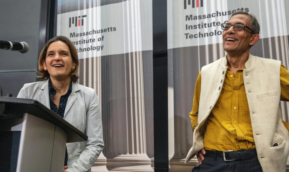 Esther Duflo, left, and Abhijit Banerjee along with Harvard's Michael Kremer, were awarded the 2019 Nobel Prize in economics for pioneering new ways to alleviate global poverty. (Michael Dwyer/AP)